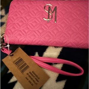 Steve Madden Big pink quilted wallet Brand New with tags! It is 8” x 7.5”